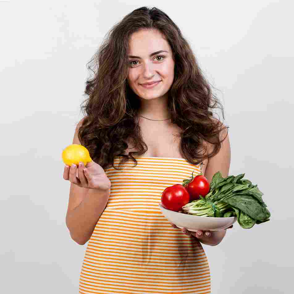 woman holding vegetables fruits 11zon