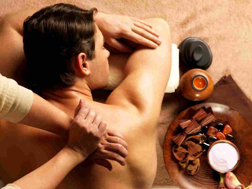 masseur doing massage backbone man body spa salon beauty treatment concept 11zon