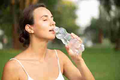 side view woman drinking water 23 2148285833 11zon